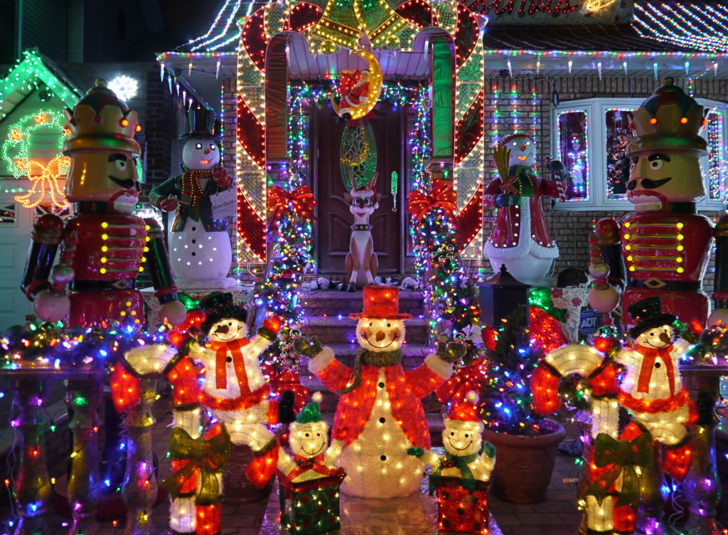 Christmas outdoor Christmas decorations - Snowman and nutcracker lights up house in Brooklyn, New York