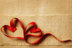 red ribbon in shape of heart